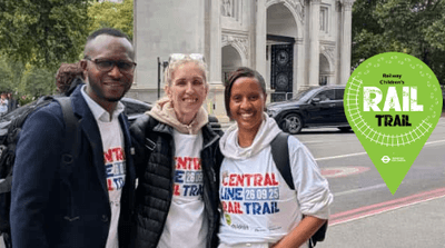 Three Rail Trail event participants posing for a photo in London wearing Rail Trail branded T-shirt in support of Railway Children.