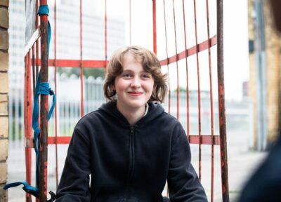 Child smiling at camera.