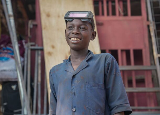 Young boy wearing safety goggles.