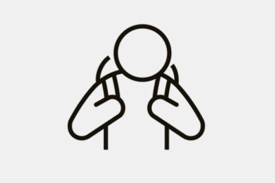 An icon of a person carrying a backpack and holding the straps.
