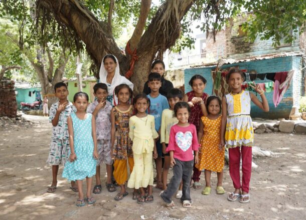 A large group of children standing in a group.