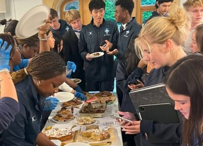 Group of children hosting a bake sale.