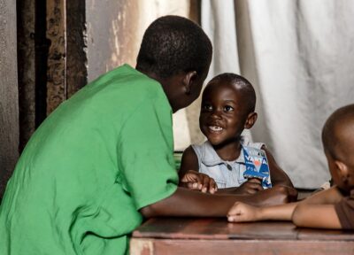 Child participating in a community education and family support programme.