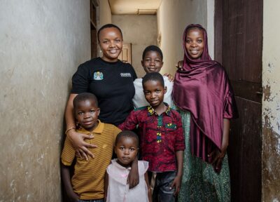 Young family benefiting from charitable initiatives that create opportunities for learning, growth and community support.