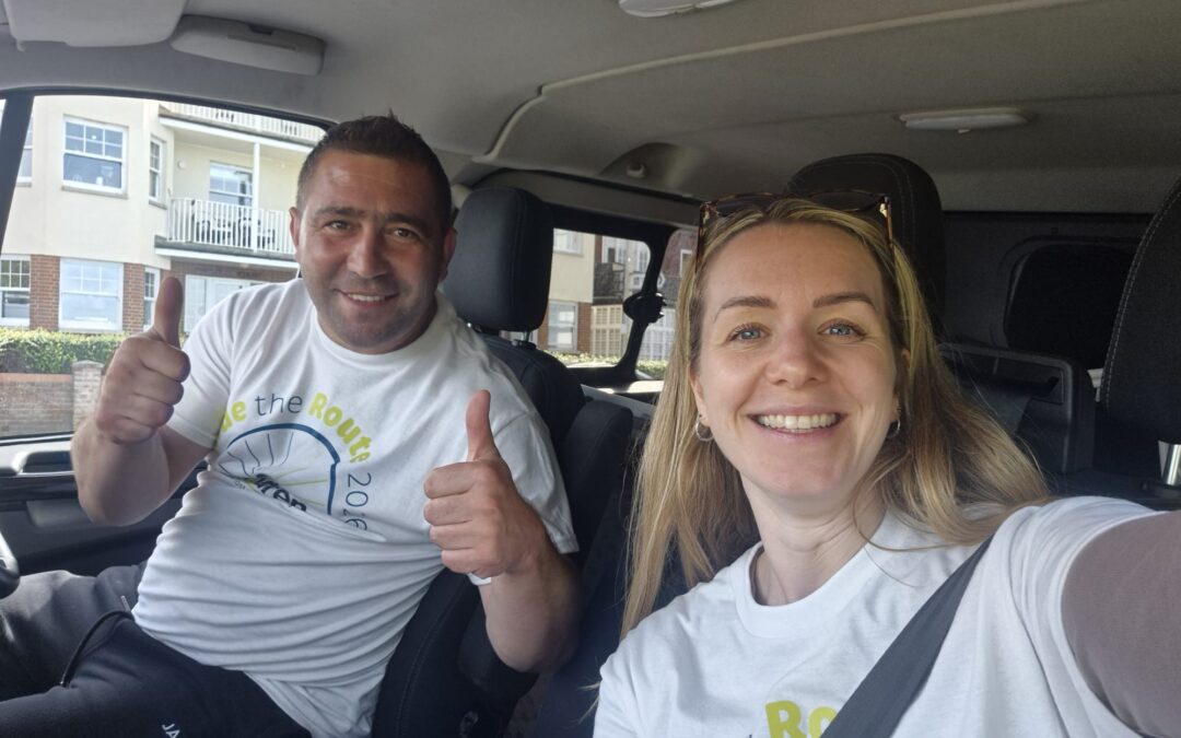 Ride the Route volunteers take a selfie whilst parked in a car during the event.